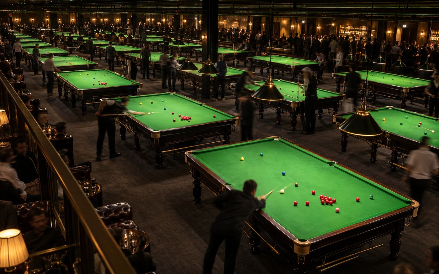 A large snooker hall at full capacity on a weekend night, every table lit and in play